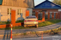 Пьяный водитель врезался в забор, пока хозяин авто спал рядом