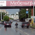 Даже в такую дождливую погоду они "работают". Перекресток Широтная-Олимпийская.